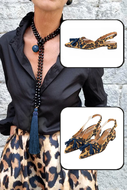 Women's animal print and navy blue elegant slingback heels, with a bow on the front. Pointed toe. Flat flare heels - Top view